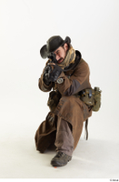  Photos Cody Miles Army Stalker Poses aiming gun kneeling whole body 0001.jpg